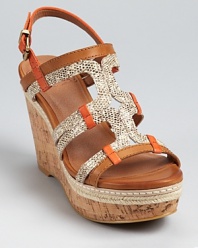 Snakeskin embossed leather mingles with smooth tangerine and dune hued leathers on these Lucky Brand wedges, finished with braided jute and a cork sole.