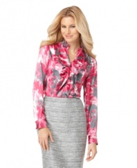 Add a punchy pop of color to slim skirts with this petite blouse from Jones New York! It features a mottled floral print and a soft satin finish for a feminine touch. (Clearance)