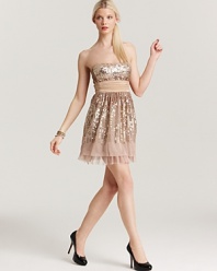 Bedecked in glittering sequins, this party-perfect BCBGMAXAZRIA dress touts a dramatic waist sash for a feminine finish.