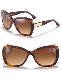 Oversized cat eye sunglasses featuring classic and glamorous design elements for year-round wear.