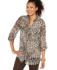 Get wild with Style&co.'s petite animal print tunic! Wear the sleeves rolled up with button tabs for a more casual look.