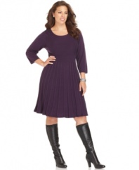 Flaunt your feminine flair this season in Spense's three-quarter sleeve plus size sweater dress, featuring a pleated A-line skirt.