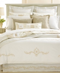 Add this sham to your Trousseau Crest bed from Martha Stewart Collection, featuring tan accents on a clean background in luxurious 300-thread count Egyptian cotton. Side/bottom overlap opening. (Clearance)