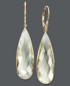 Pale green hues make the perfect splash. Earrings feature teardrop-shaped green amethyst (25 ct. t.w.) accented by a sparkling diamond. Crafted in 14k gold. Approximate drop: 2 inches.