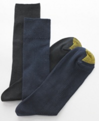 Softly spun for a sleek finish, these ribbed dress socks from Gold Toe come in a convenient four-pack to jump start your workweek.
