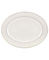 Laced with vintage elegance, the Chapel Hill oval platter features a modern silhouette and prim doily pattern with platinum trim. Fine bone china from kate spade new york ensures a head-turning table setting for dinner parties, holidays and more.
