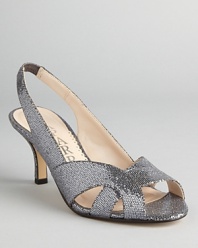 Sparkle in these glittery Caparros sandals; a wearable heel lets you dance the night away without kicking them off.