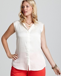 The classic white VINCE CAMUTO Plus shirt gets a warm-weather refresher with a sleek sleeveless silhouette. Let the crisp style pop against printed pants.