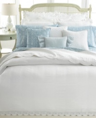This European sham from Lauren Ralph Lauren features delicate eyelet embroidery and ruffle trim for a elegant addition to the Spring Hill bedding collection. Button closure.