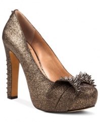 Danger: may cause jealousy. The Jamma platform pumps by Vince Camuto take fierce fashion to the next level with the addition of pointed metal studs at the bow accent and sky-high heel.