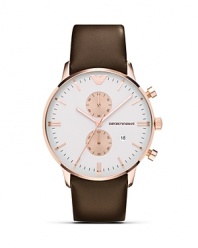 Ever-chic with modern touches. Emporio Armani's round-face watch is the ideal around-the-clock piece, accented by a rose-gold plated case with a sleek leather strap.
