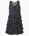 Combining the sturdy construction of denim with the floaty ruffles on this tiered dress from DKNY gives her a style that's special.