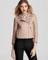 Elegant quilting and a soft, pastel hue lend femininity to this otherwise tough-chic Theory leather jacket.