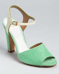 In a minty hue, these Moschino Cheap and Chic sandals boast soft suede and a leather ankle strap in a contrasting color. Pair them with pastel toes in pale pink and embrace the season's love for lights.