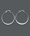Make these subtly graduated sterling silver hoops part of your morning routine and you'll always be perfectly accessorized. Approximate diameter: 1 inch.