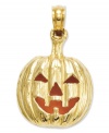What's spooky and stylish all at once? This clever, cut-out pumpkin charm! Crafted from 14k gold, the inside glows with an orange enamel finish. Chain not included. Approximate length: 4/5 inch. Approximate width: 1/2 inch.