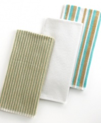 Grab style and keep function with a set of three kitchen towels that step forward in eye-catching color to wipe up spills, aid in prep and add an accent to your space. The ribbed side sets a sharp appearance for any room, while the highly absorbent terry quickly cleans up. Limited lifetime warranty.