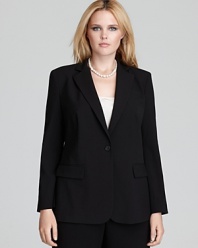 A unique tiered back peplum elevates this classic DKNYC long sleeve jacket--a feminine twist to the perennial style.