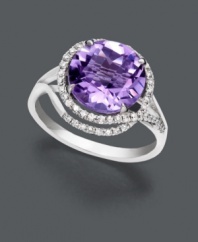 Make a clear statement with bold color. This Effy Collection ring features a stunning round-cut amethyst (4-1/4 ct. t.w.) surrounded by swirls of sparkling diamond (1/4 ct. t.w.). Crafted in 14k white gold.