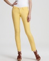 In a bold banana hue, these Aqua jeans make a statement impossible to ignore.