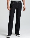 7 For All Mankind delivers a pair of super-cool dark-washed jeans, featuring a trend-right look with a relaxed, straight leg.