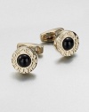 Round gold-tone cuff links with onyx center and engraved zodiac sign motif.Brass/onyxAbout ¾ diam.Made in Italy
