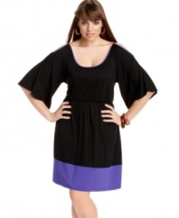 Heat up your look with Soprano's cold-shoulder plus size dress, featuring on-trend colorblocking.