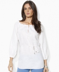 This breezy Lauren by Ralph Lauren petite tunic is rendered in lightweight linen with delicate embroidery and smocking at the neckline for a bohemian look. (Clearance)