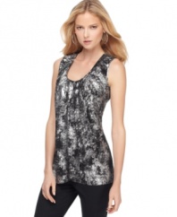 MICHAEL Michael Kors metallic-printed top shines as a top pick for parties and nights out on the town. Pair with skinny black pants or dark jeans and your favorite heels. (Clearance)