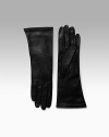 EXCLUSIVELY AT SAKS. Smooth, supple leather with warm cashmere lining. About 11 long Made in Italy