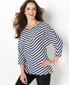 Striking stripes and chic dolman sleeves come together for petite weekend style from Charter Club! The relaxed fit makes it a perfect match with slim pants. (Clearance)