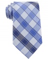 Give any solid shirt a preppy punch with this crisp plaid tie from Nautica.