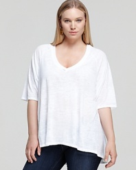 A contemporary spin on the classic white tee, this Nation LTD Plus top flaunts a dramatic high/low hem and a chic burnout print for real modern edge.