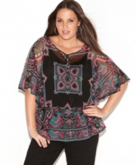 Flaunt your boho flair with INC's butterfly sleeve plus size peasant top, cinched by a smocked waist.