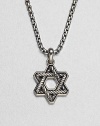 The familiar angles of the Star of David are intricately carved, set in polished sterling silver on a box-chain necklace.Sterling silverbulletNecklace, about 20 longPendant, about 1 wideLobster claspImported