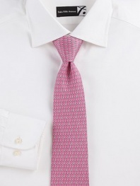 An artistic, colorful pattern is handsomely woven in fine Italian silk.SilkDry cleanMade in Italy
