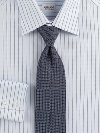 A sophisticated look woven in Italian silk, with a polished diamond pattern.SilkDry cleanMade in Italy